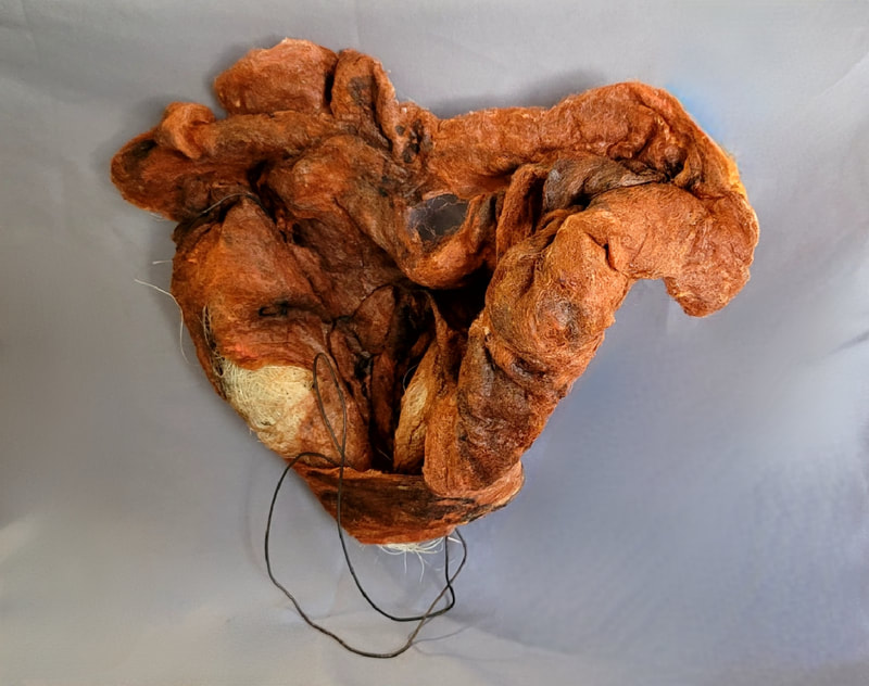 Susan Karhroody</br>
“My Womb My Right #2”</br>
2022</br>
Felt, natural fiber, metal and stiches</br>
$1400.00